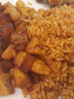 A picture of Jollof rice and dodo.