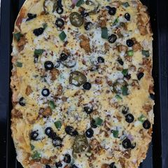 A picture of Smokey_tikka pizza.