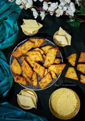 A picture of Chandrakanti Pitha / Yellow lentil pancake.