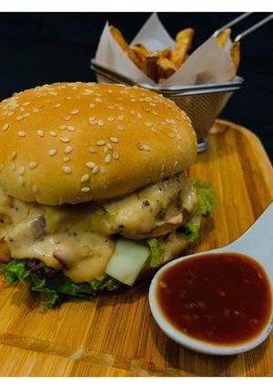 A picture of Grilled Chicken Burger with Lettuce Sauce! 🍔.