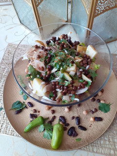 A picture of Beans with onions etc.