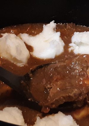 A picture of Crockpot Potato Topped Swiss Steak.