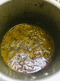 A picture of Tomato & mutton curry.