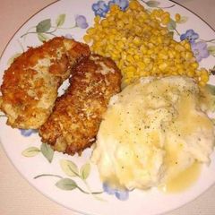 A picture of Chicken Steak with mashed potato.