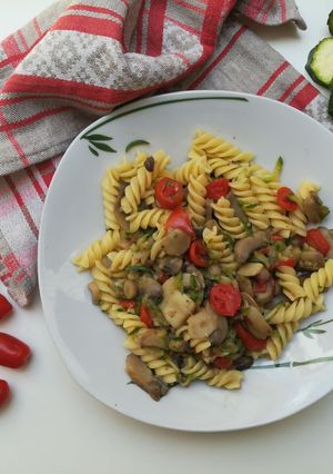 A picture of Pasta with Zucchini, Mushrooms, and Cherry Tomatoes.