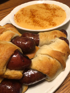 A picture of Brats and Beer Cheese.
