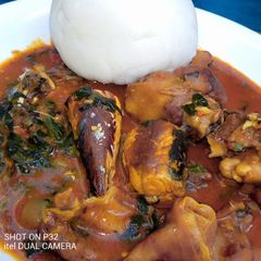 A picture of Pounded yam with ogbono soup.