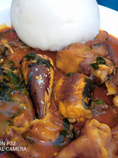 A picture of Pounded yam with ogbono soup.