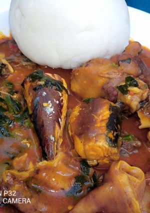 A picture of Pounded yam with ogbono soup.