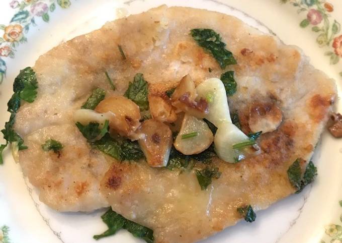 Filetes de pescado al mojo de ajo con cilantro Receta de Mercedes Cossío-  Cookpad