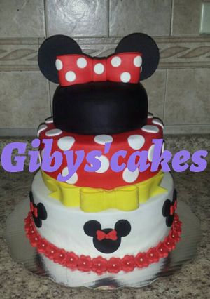 Una foto de Pastel en fondant minnie mouse