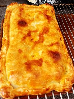 Una foto de Empanada rápida de atún y pisto