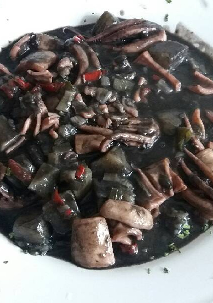 Una foto de Potas encebolladas en tinta