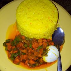 A picture of Curry rice and carrot sauce.