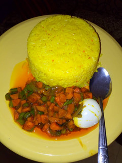 A picture of Curry rice and carrot sauce.