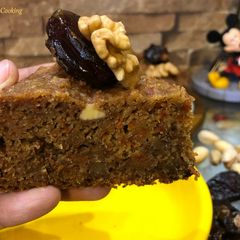 A picture of Eggless No Sugar Treat For Christmas – Whole Wheat Carrot Dates Walnut Cake In Cooker.