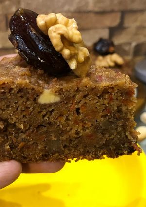 A picture of Eggless No Sugar Treat For Christmas – Whole Wheat Carrot Dates Walnut Cake In Cooker.