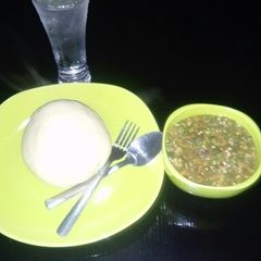 A picture of Semo and fresh okro soup.
