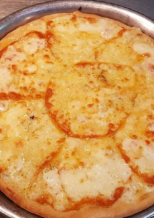 Una foto de Pizzas a los 4 quesos