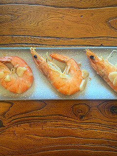 Una foto de Langostinos al ron
