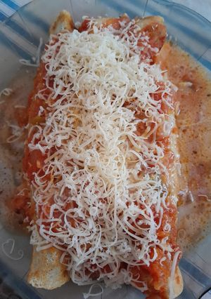 Una foto de Canelones de acelga y huevo