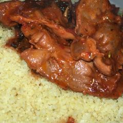 A picture of Turkish couscous with gizzard sauce.