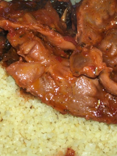 A picture of Turkish couscous with gizzard sauce.