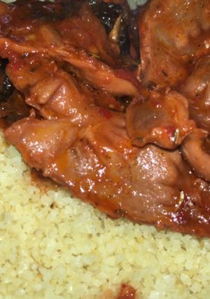 A picture of Turkish couscous with gizzard sauce.