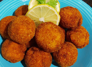 Una foto de Croquetas de Papa con Carré de Cerdo