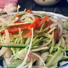 Restaurant style Kachumber Salad (with vinegar dressing) A picture of Restaurant style Kachumber Salad (with vinegar dressing).