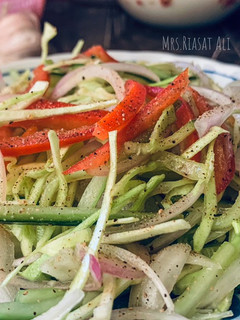 A picture of Restaurant style Kachumber Salad (with vinegar dressing).