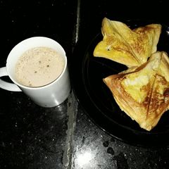 Toast bread and tea A picture of Toast bread and tea.