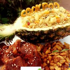 Pineapple Fried Rice with peppered chicken and fried plantain A picture of Pineapple Fried Rice with peppered chicken and fried plantain.