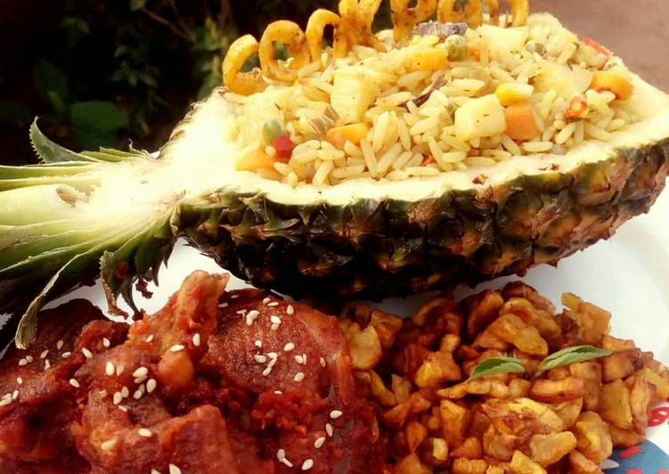 How to  Pineapple Fried Rice with peppered chicken and fried plantain
