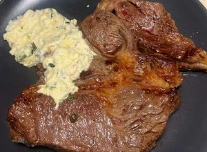 Foto di Reale al burro con erbe aromatiche in salsa