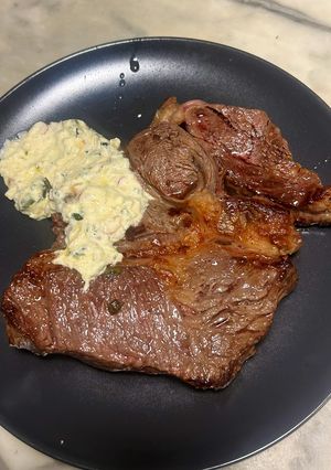 Foto di Reale al burro con erbe aromatiche in salsa