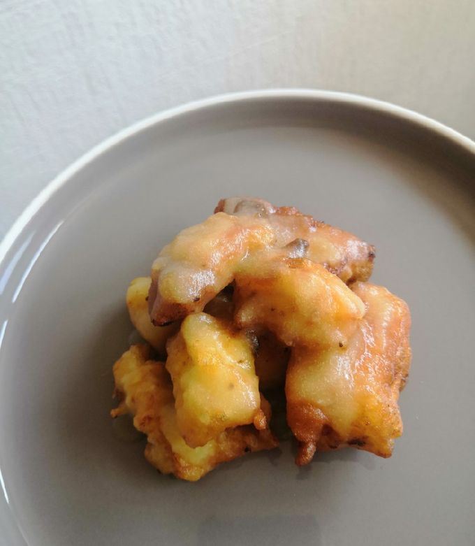 Una foto de Pollo rebozado con salsa de piña