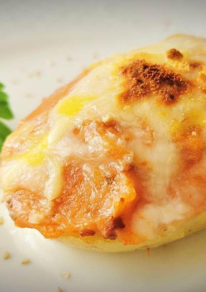 Una foto de Patatas rellenas de Boloñesa al Parmesano