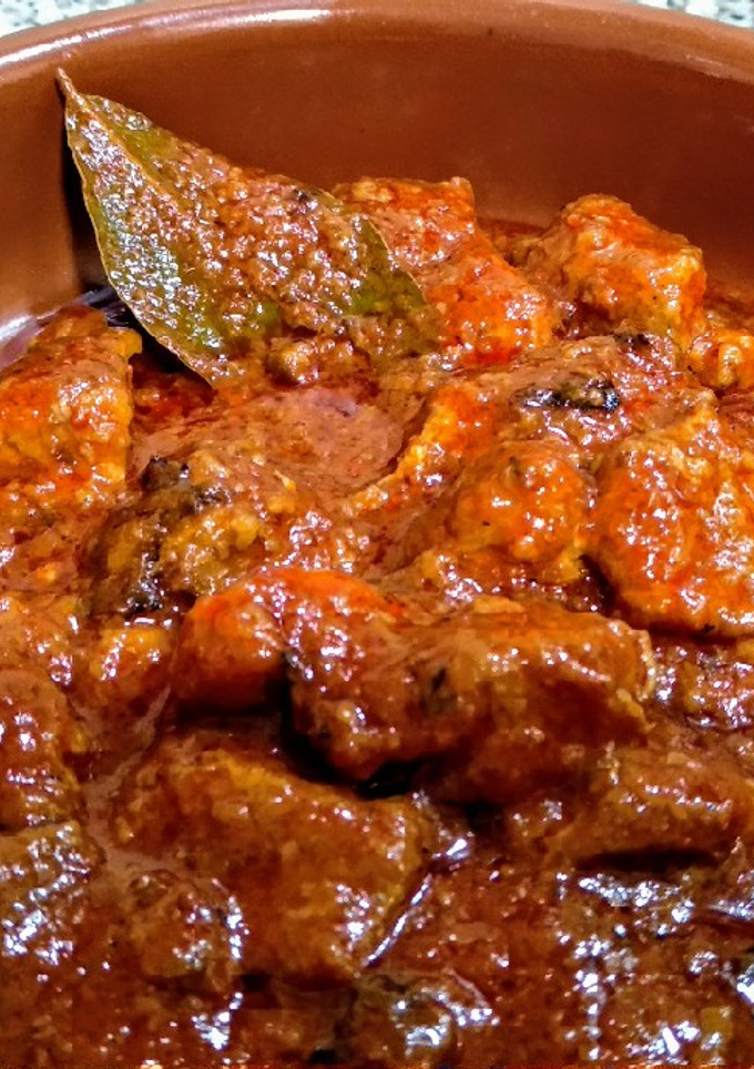 Una foto de Magra de cerdo con tomate