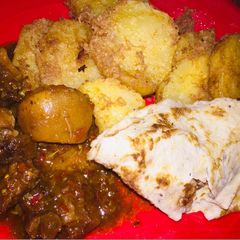 A picture of Sweet potatoes and cowtail sauce.