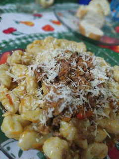 Una foto de Ñoquis de papa con salsa bolognesa