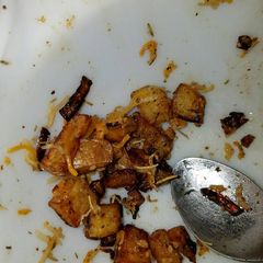 A picture of Rosemary potatoes and onions.