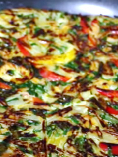 Una foto de Tortilla de macedonia de verduras