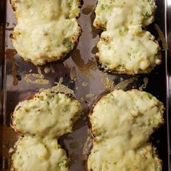 A picture of Cheese and broccoli baked potatoes.