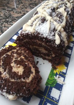 Una foto de Pionono de chocolate y café