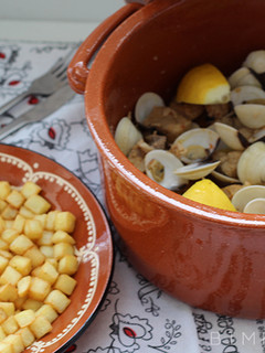Foto de Carne de porco à alentejana com batatas rissolée