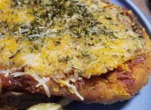 Una foto de Pollo a la Milanesa