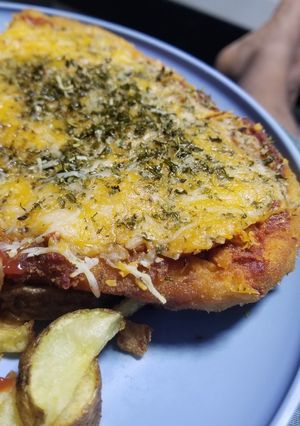 Una foto de Pollo a la Milanesa