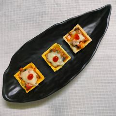 A picture of Pizza canapes.