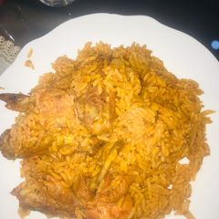 A picture of Palm Oil Jollof Rice.